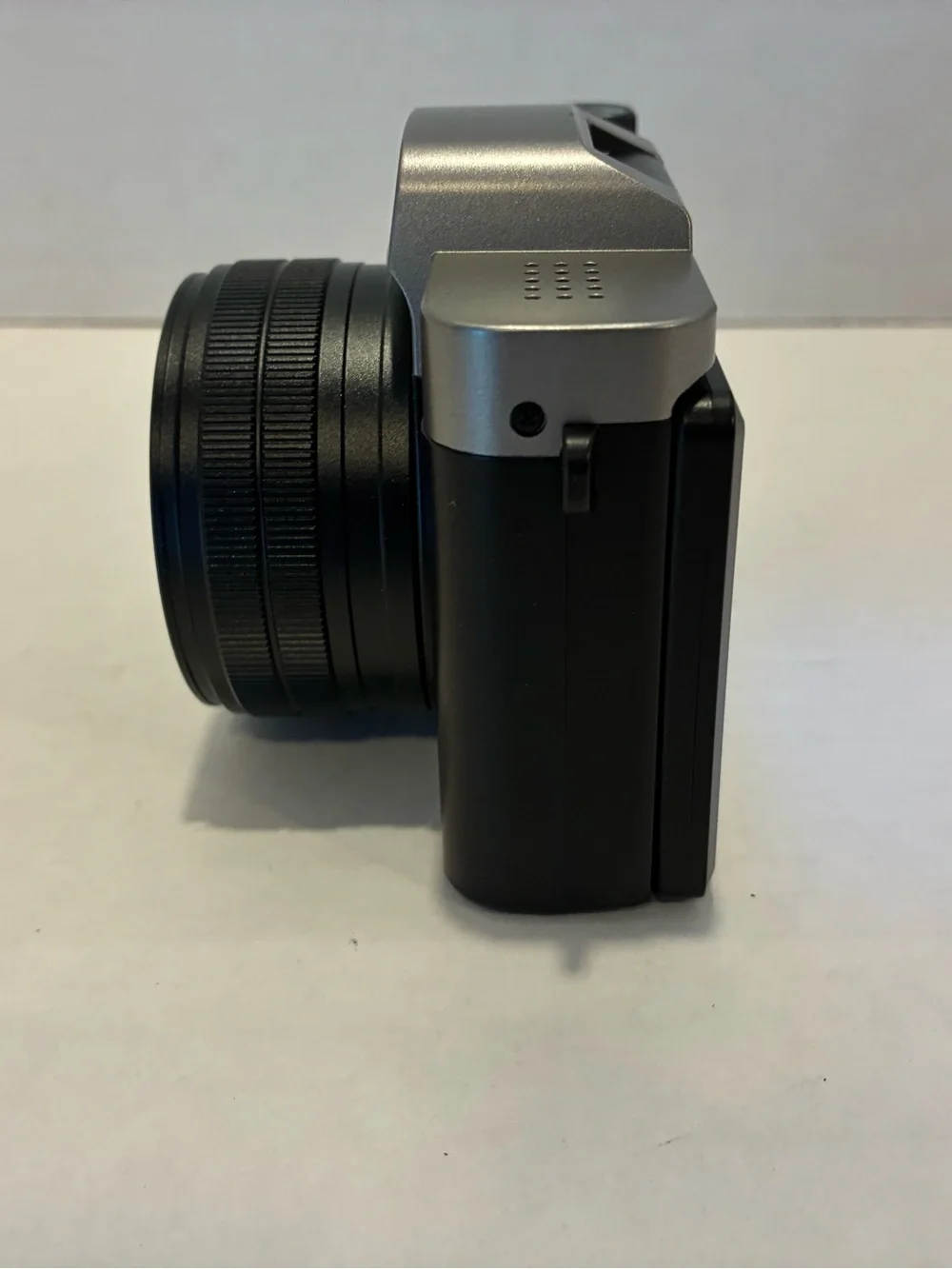 Compact Black and Silver Digital Camera with Auto Focus